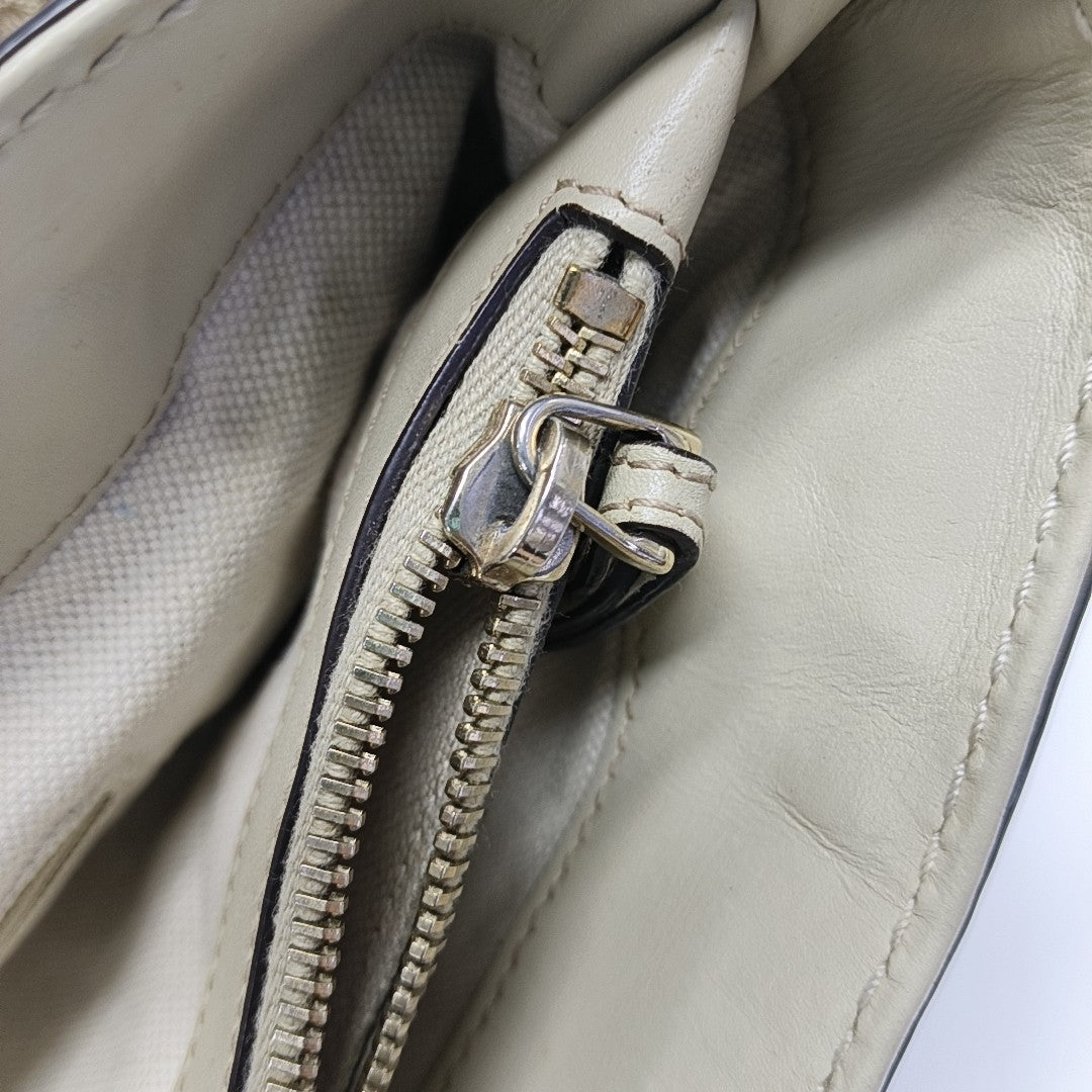 Sukey Monogram Canvas Brown