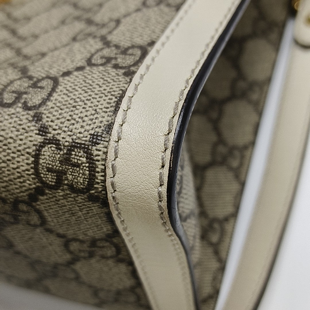 Padlock Small Monogram Coated Canvas Beige
