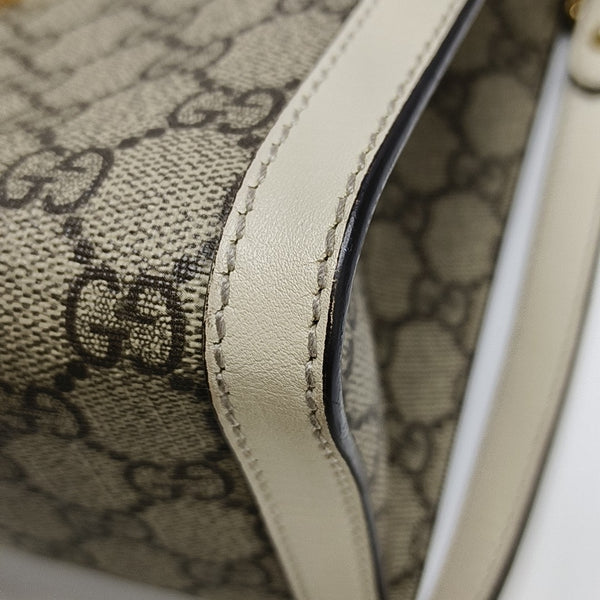 Padlock Small Monogram Coated Canvas Beige