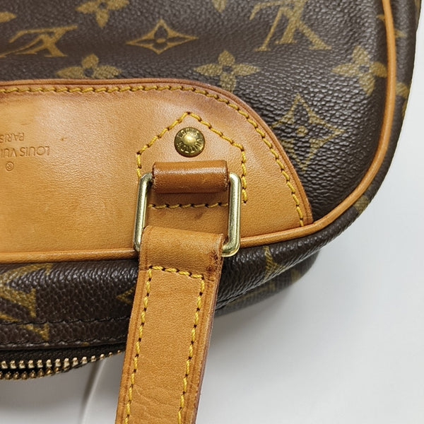 EXCURSION Monogram Coated Canvas Brown