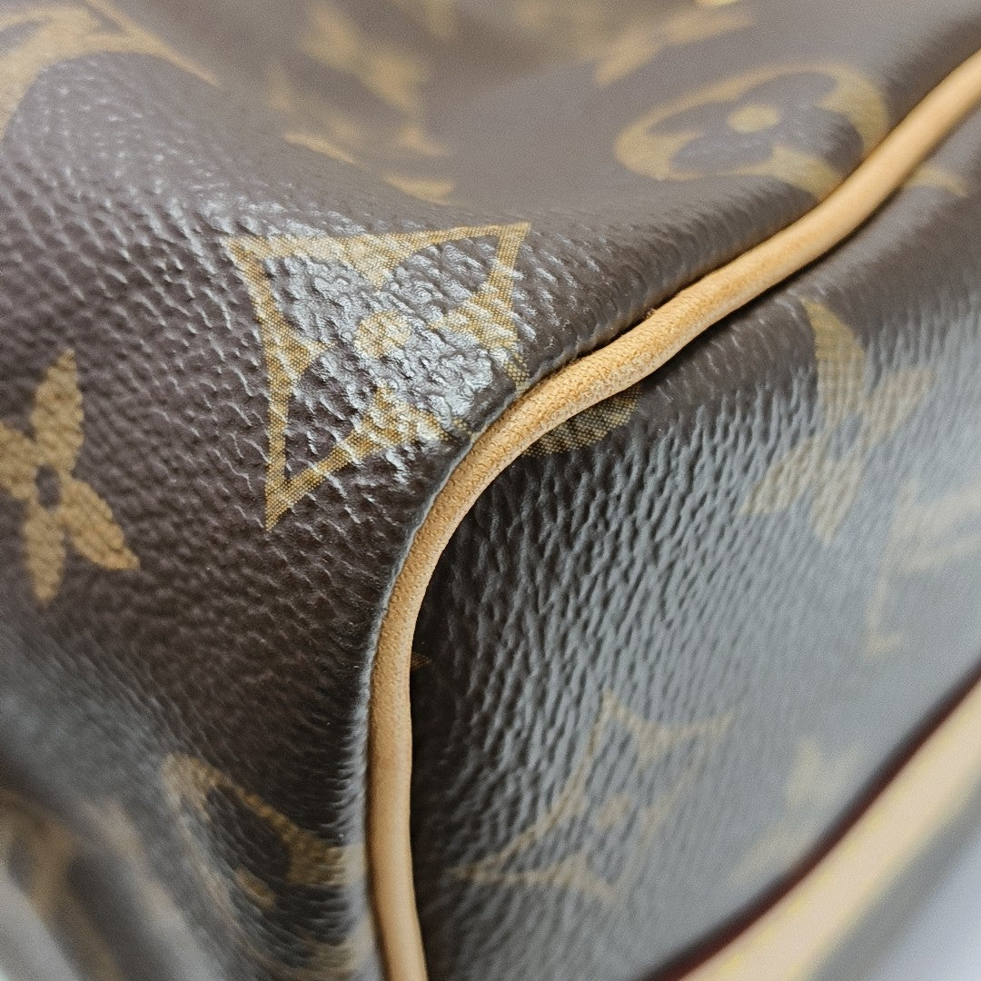 SPEEDY 25 Monogram Coated Canvas Brown
