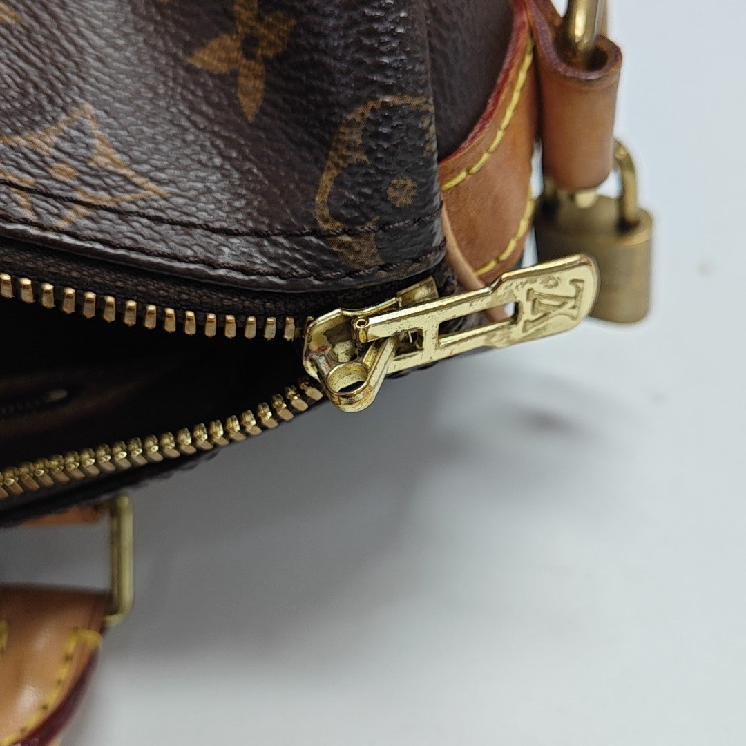 SPEEDY 25 Monogram Coated Canvas Brown