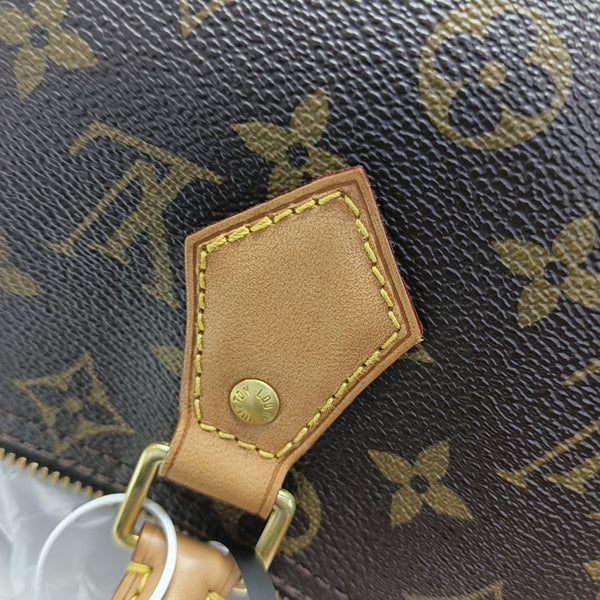 SPEEDY 25 Monogram Coated Canvas Brown