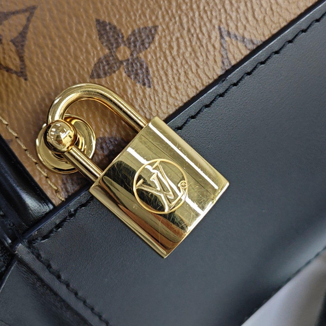 CANNES PM Monogram Coated Canvas Brown