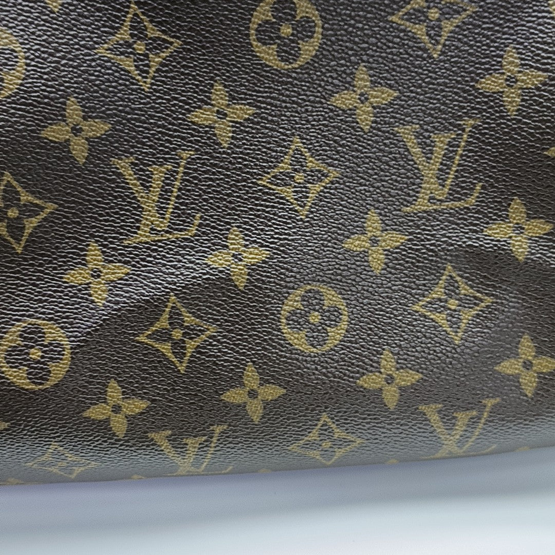 SPEEDY 30 Monogram Coated Canvas Brown
