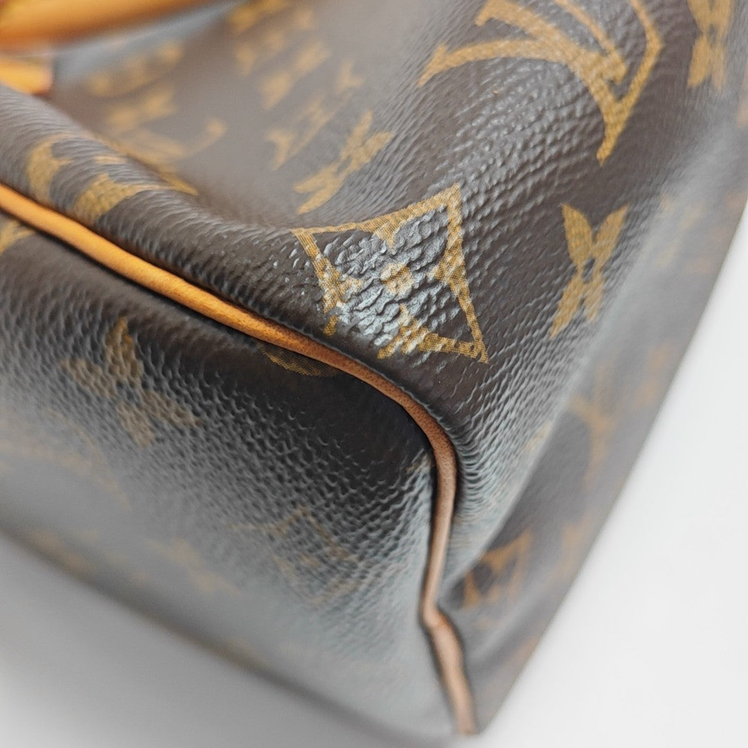 SPEEDY 25 Monogram Coated Canvas Brown