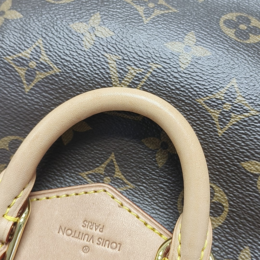 EXCURSION PM Monogram Coated Canvas Brown