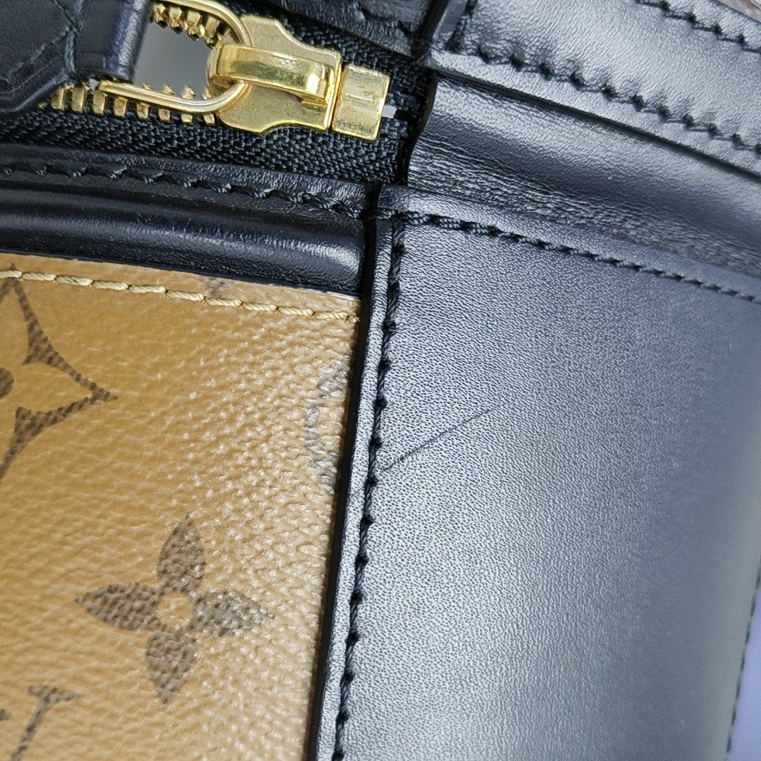 CANNES PM Monogram Coated Canvas Brown