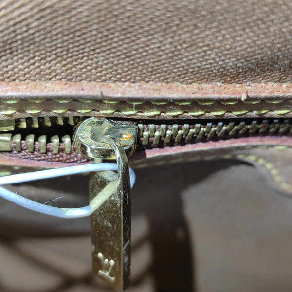 LOOPING PM Monogram Coated Canvas Brown