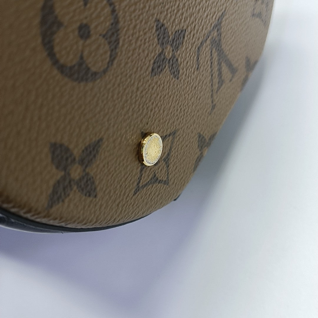 CANNES PM Monogram Coated Canvas Brown