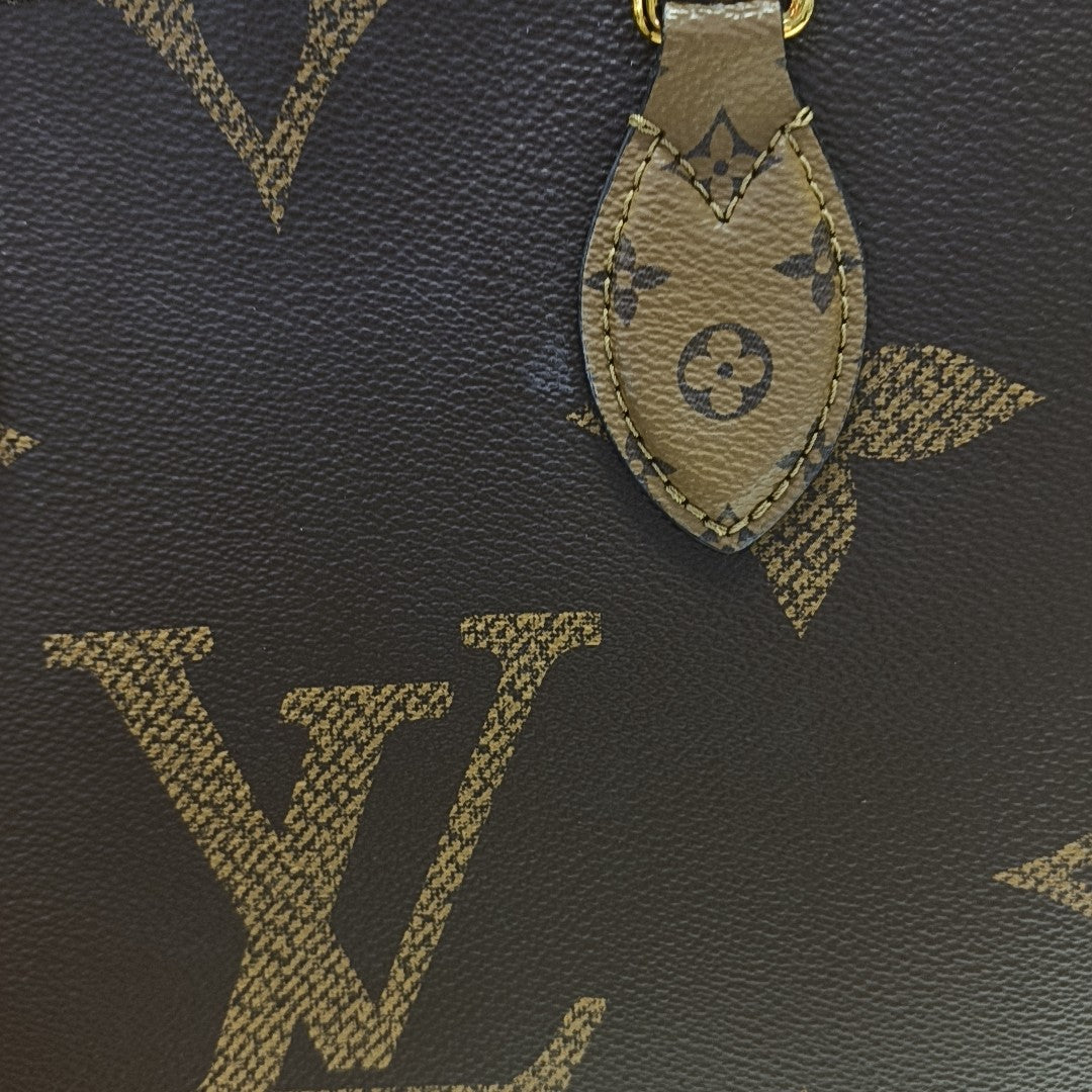 ONTHEGO MM Monogram Coated Canvas Brown