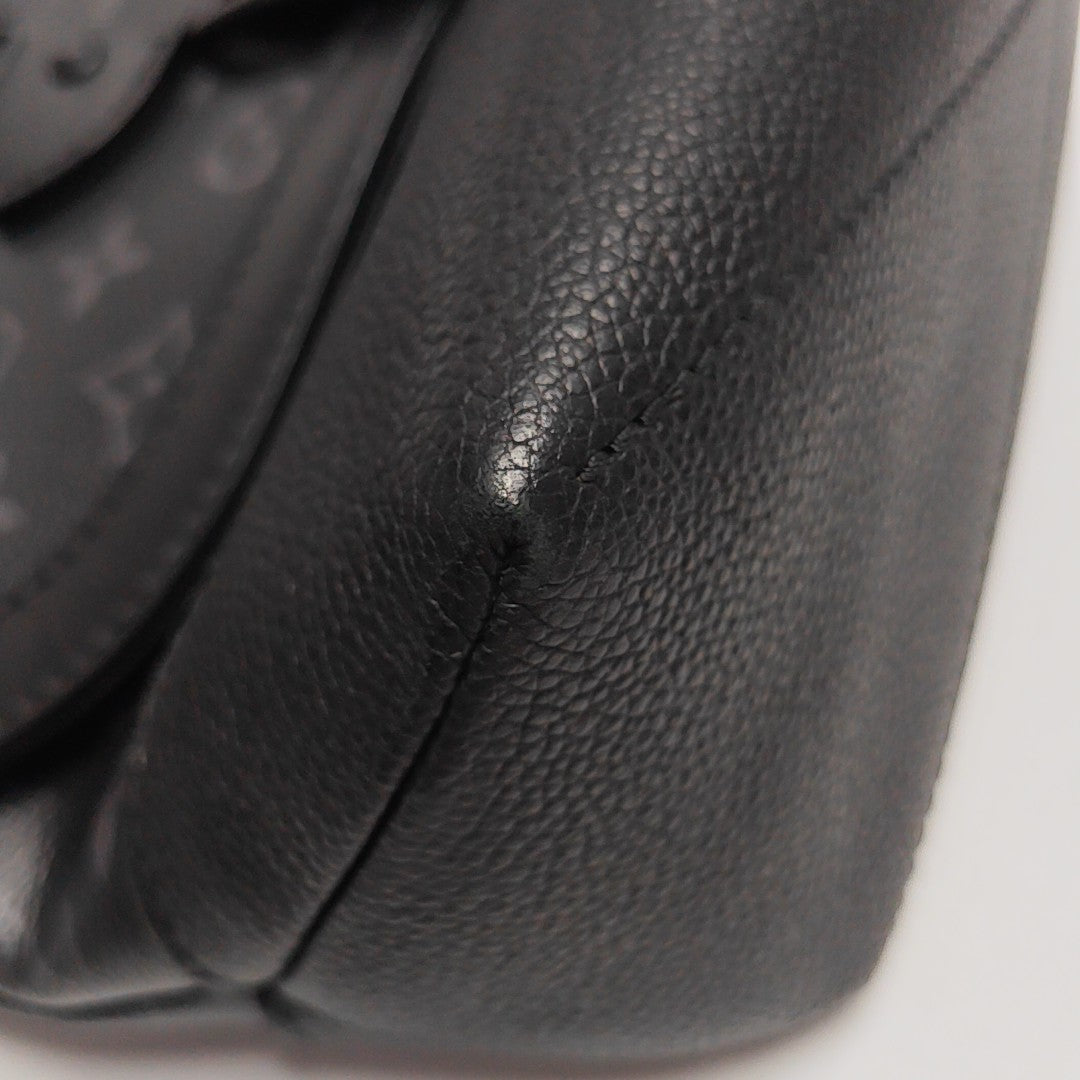 SAUMUR Monogram Coated Canvas Black