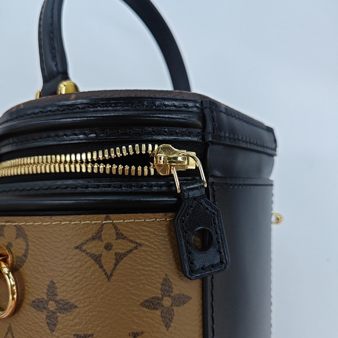 CANNES PM Monogram Coated Canvas Brown