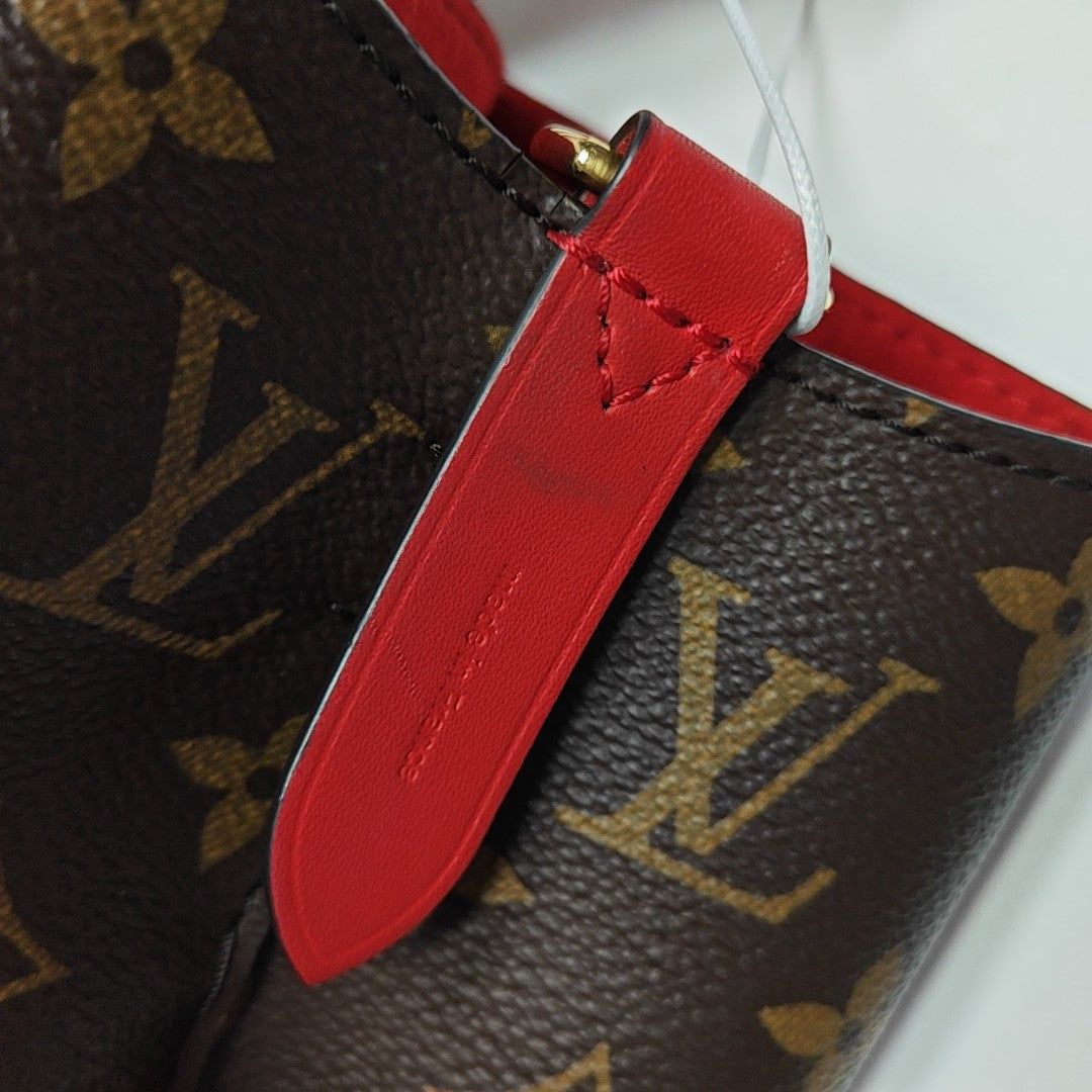 NÉONOÉ MM Monogram Coated Canvas Brown