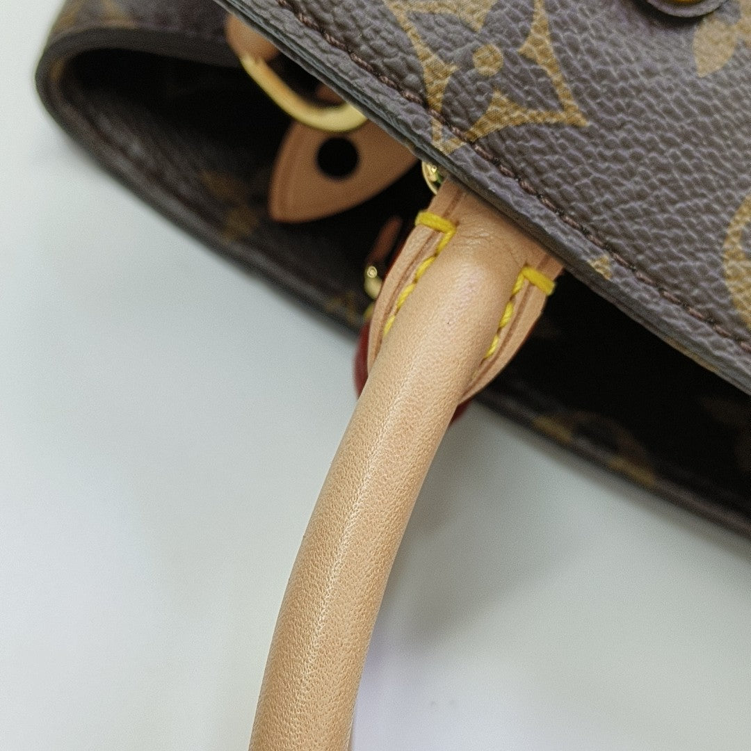 MONTAIGNE Monogram Coated Canvas Brown