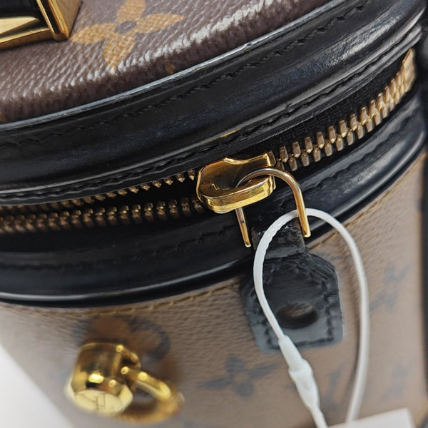 CANNES PM Monogram Coated Canvas Brown