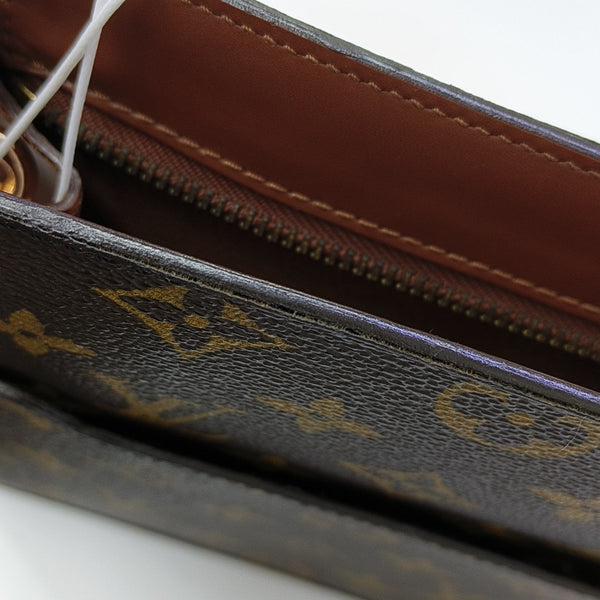Monogram Coated Canvas Clutch Brown
