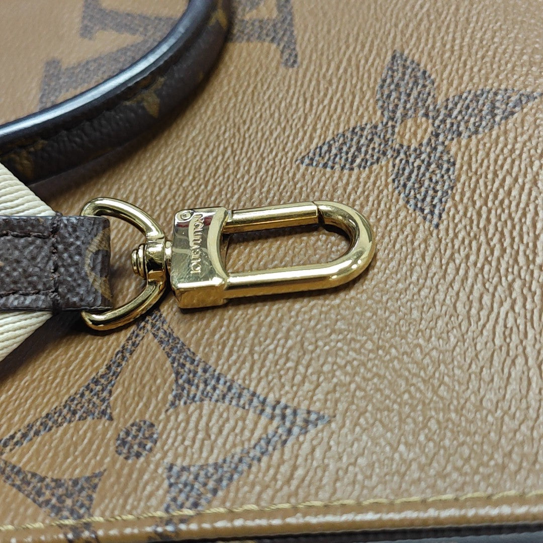 ONTHEGO PM Monogram Coated Canvas Brown