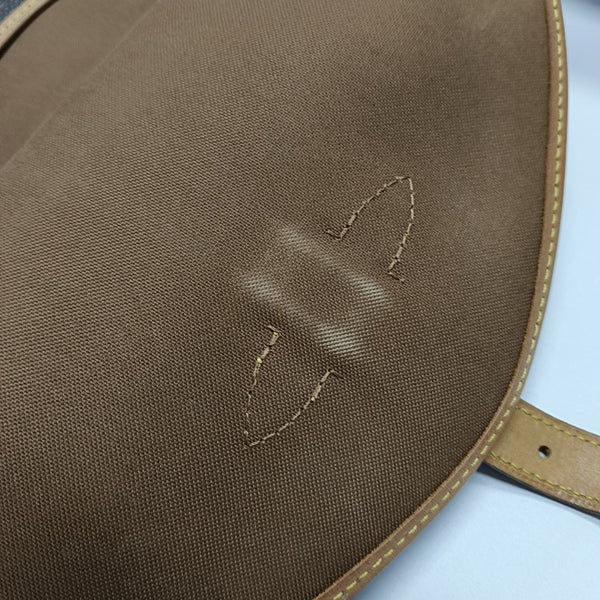 SAUMUR 30 Monogram Coated Canvas Brown