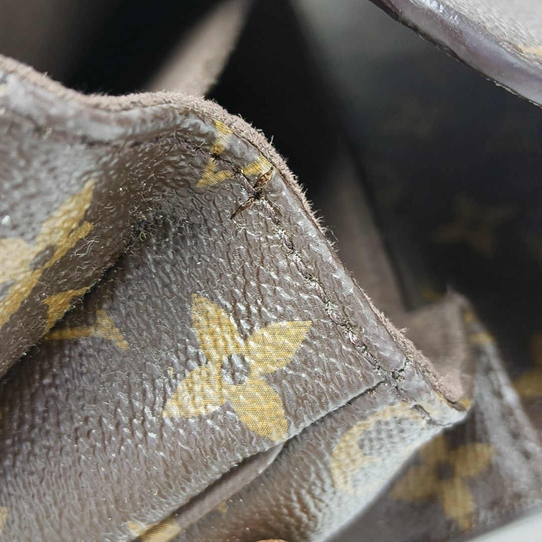 MÉTIS MM Monogram Coated Canvas Brown