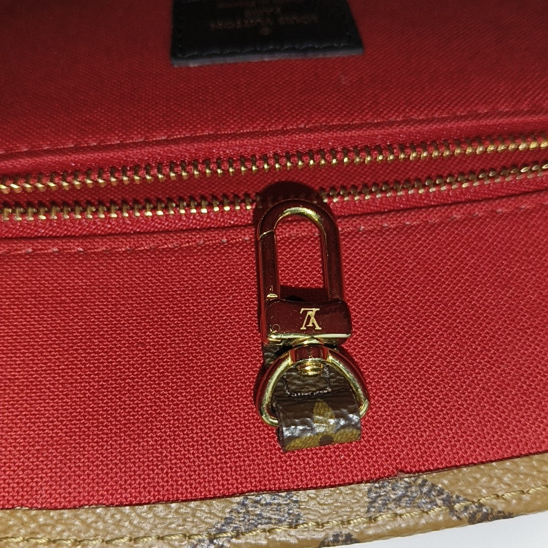 ONTHEGO PM Monogram Coated Canvas Brown