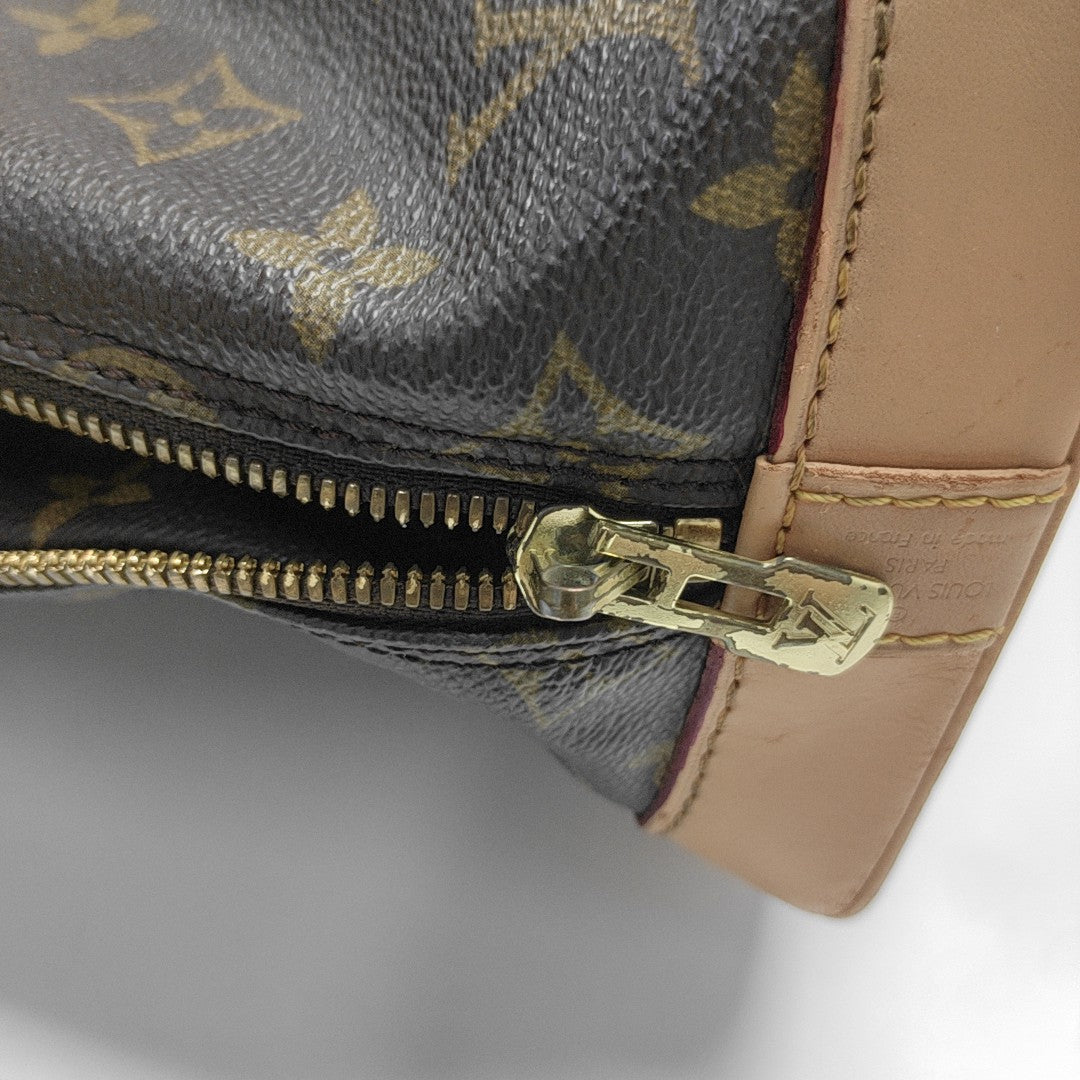 ALMA PM Monogram Coated Canvas Brown