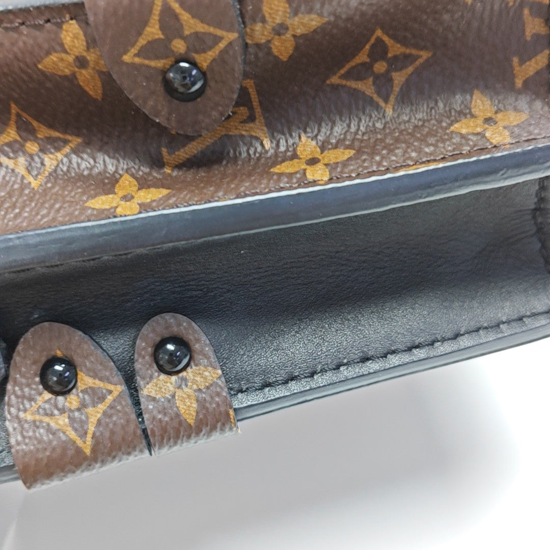 TRUNK Monogram Coated Canvas Brown