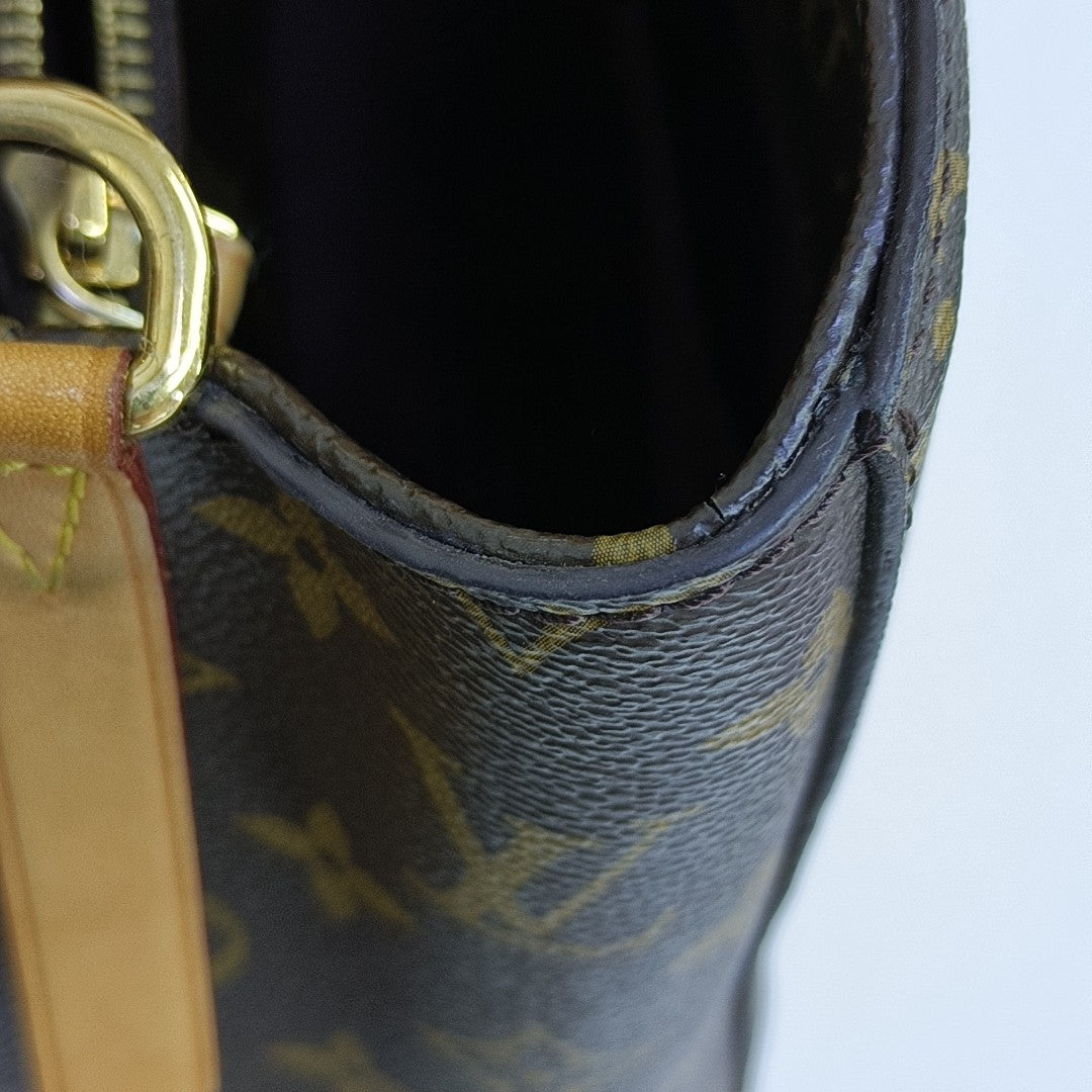 MONTAIGNE Monogram Coated Canvas Brown