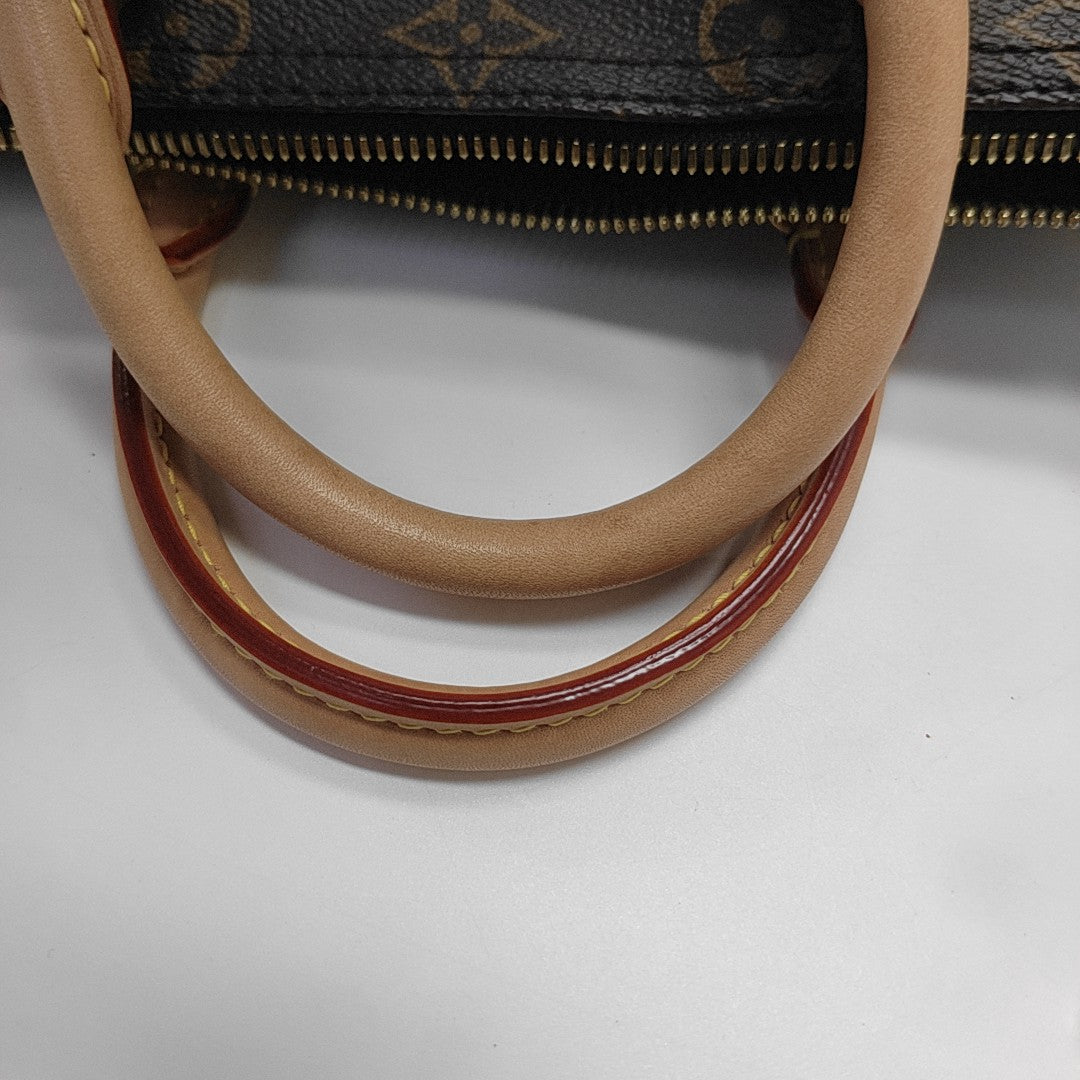 SPEEDY 25 Monogram Coated Canvas Brown