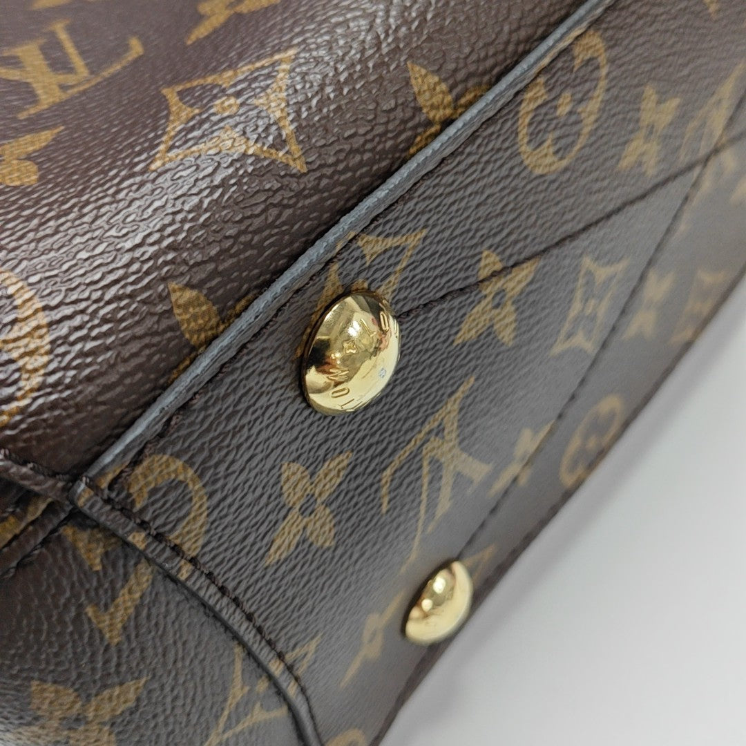MONTAIGNE Monogram Coated Canvas Brown