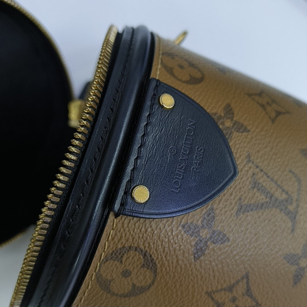 CANNES PM Monogram Coated Canvas Brown