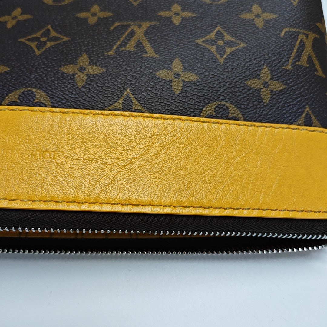 DAILY Monogram Coated Canvas Brown