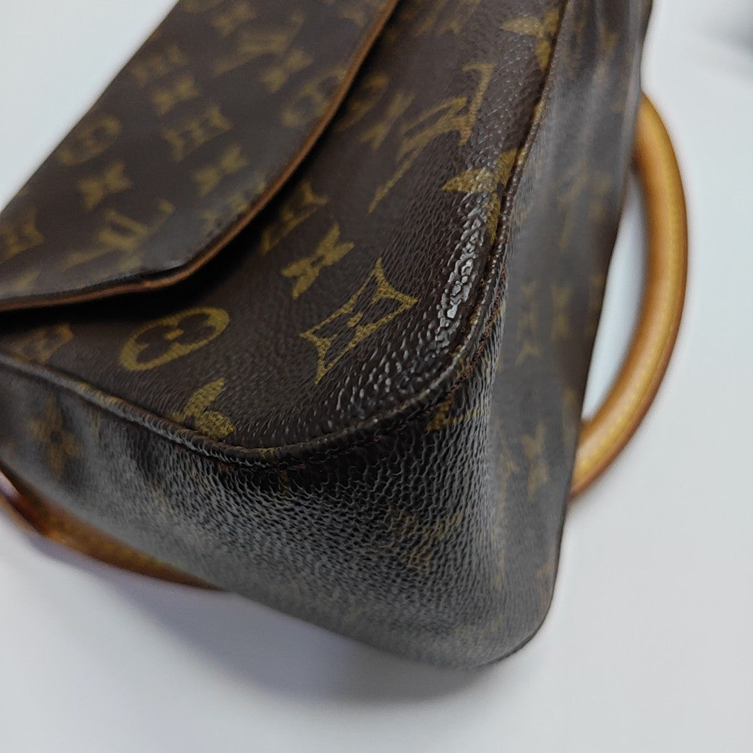 LOOPING PM Monogram Coated Canvas Brown