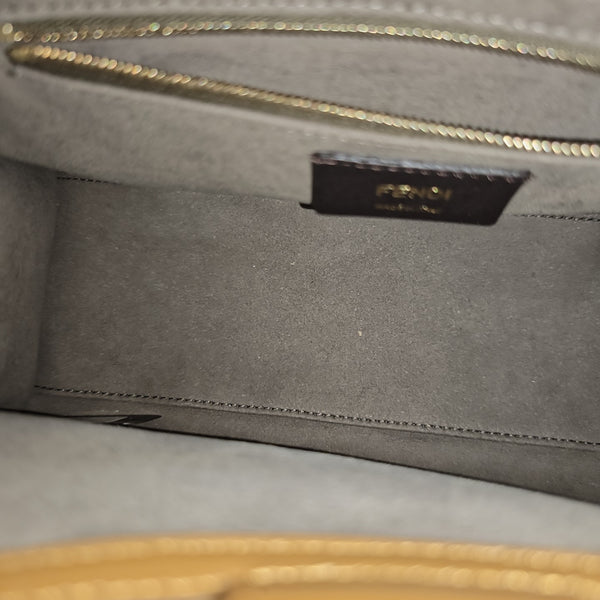Runaway Small Coated Canvas Brown