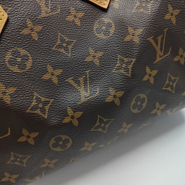 SPEEDY 25 Monogram Coated Canvas Brown