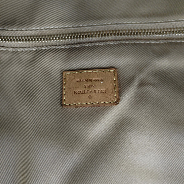 DELIGHTFUL Monogram Coated Canvas Brown