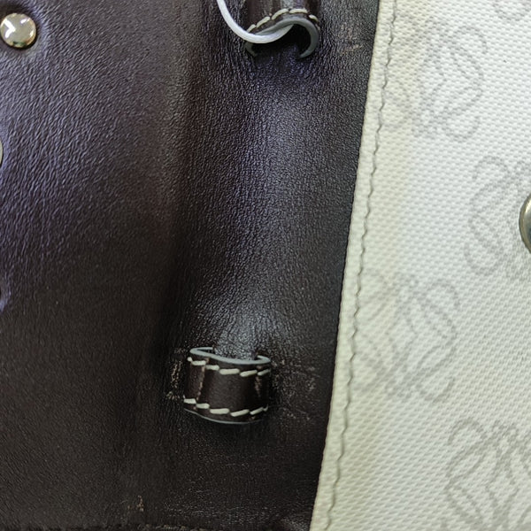Monogram Coated Canvas Clutch White