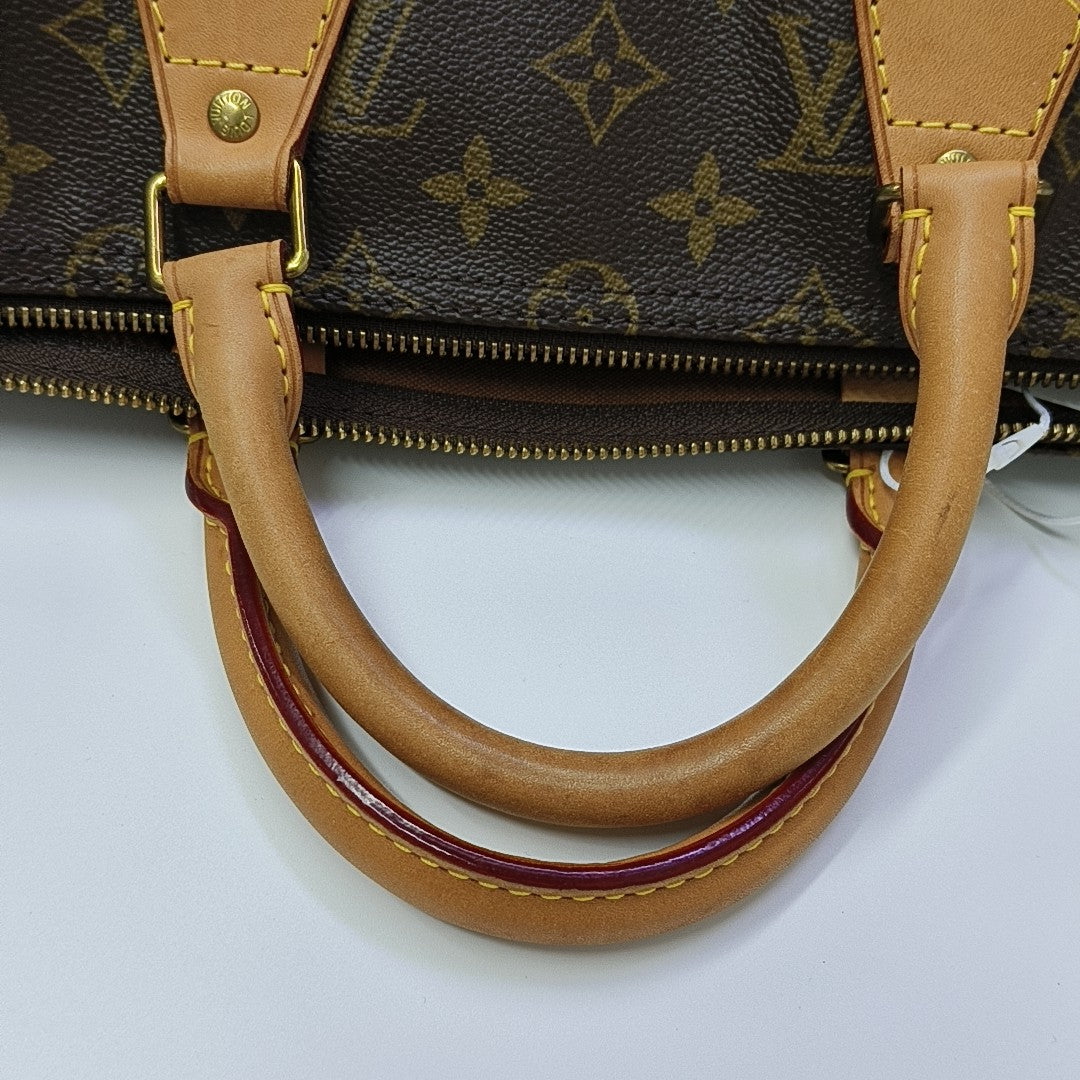 SPEEDY 35 Monogram Coated Canvas Brown