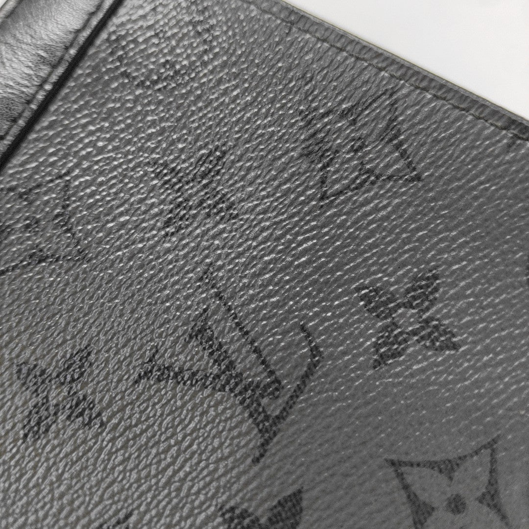 Pochette Voyag MM Monogram Coated Canvas Gray