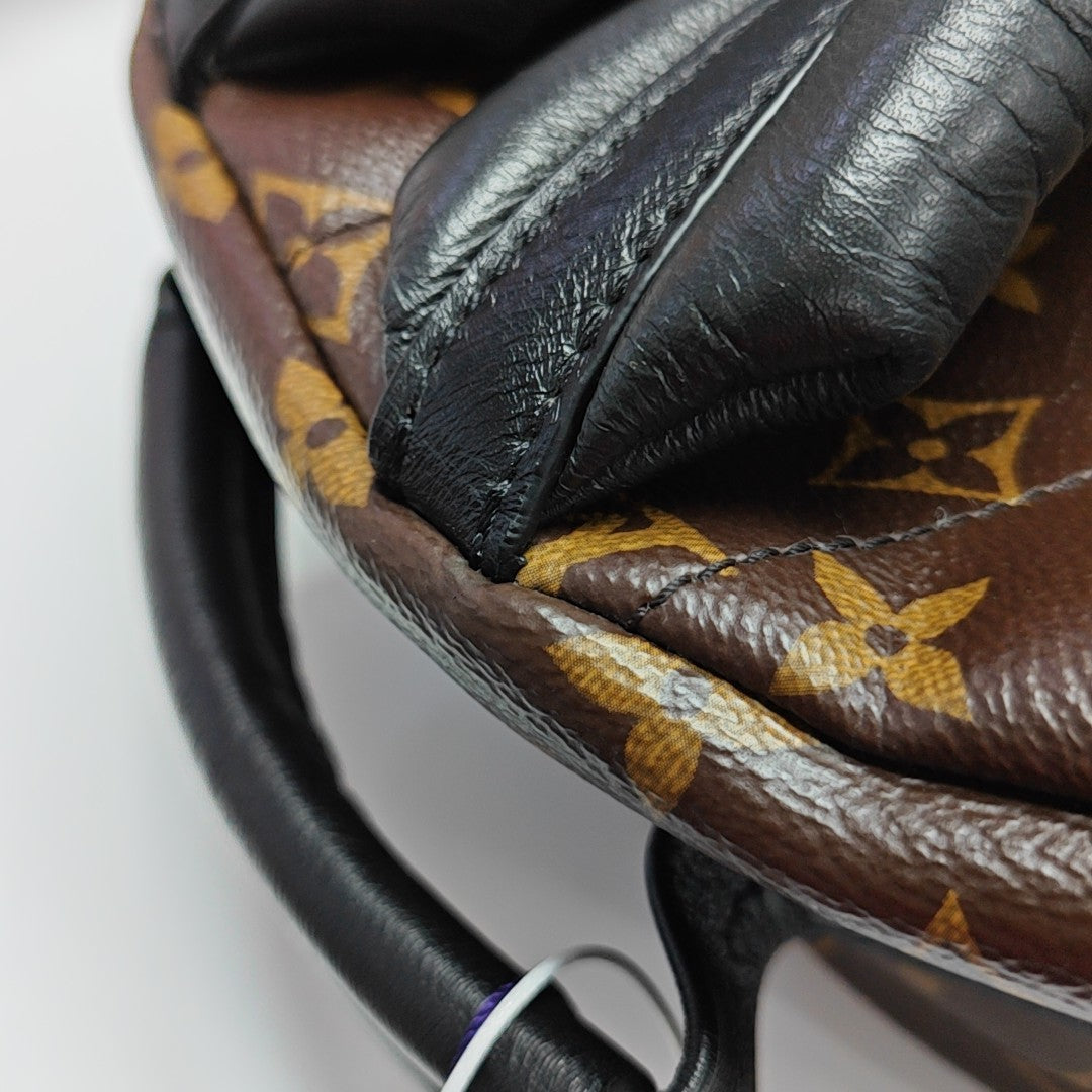 Monogram Coated Canvas Backpack Brown