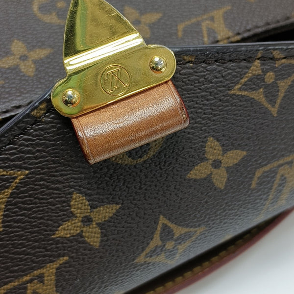 MÉTIS EAST WEST Monogram Coated Canvas Brown