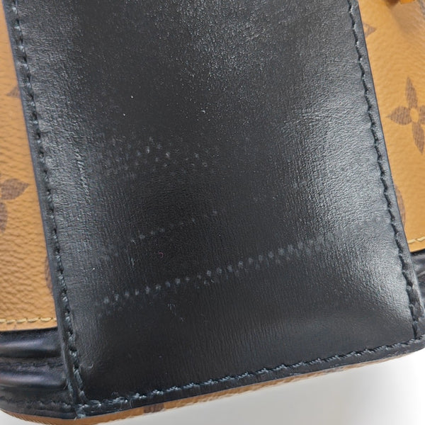 CANNES PM Monogram Coated Canvas Brown