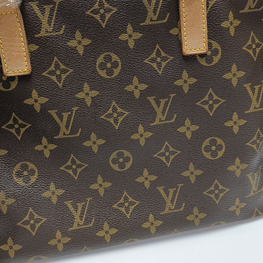PIANO PM Monogram Coated Canvas Brown