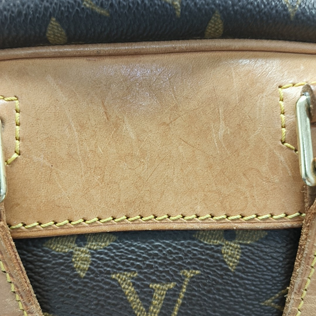 EXCURSION Monogram Coated Canvas Brown