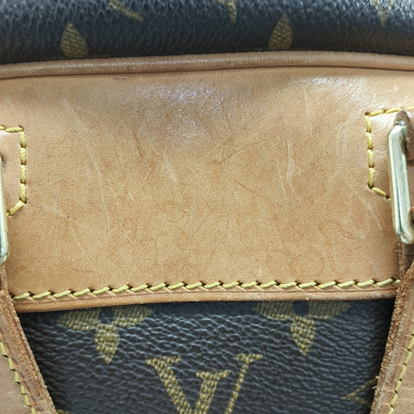 EXCURSION Monogram Coated Canvas Brown