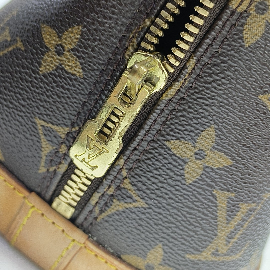 ALMA PM Monogram Coated Canvas Brown