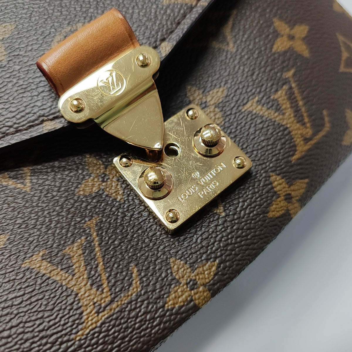MÉTIS EAST WEST Monogram Coated Canvas Brown