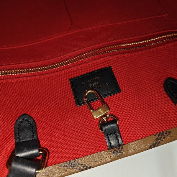 ONTHEGO MM Monogram Coated Canvas Brown