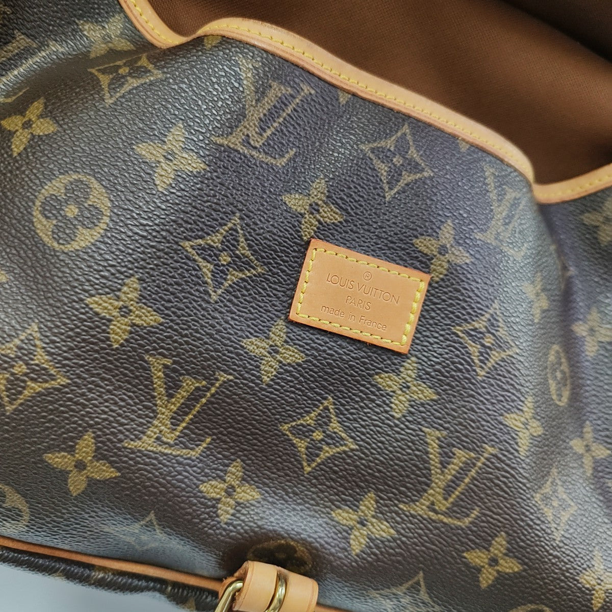 SAUMUR Monogram Coated Canvas Brown