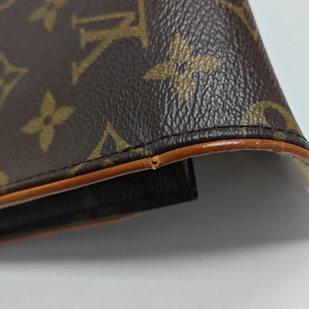 TWIN GM Monogram Coated Canvas Brown